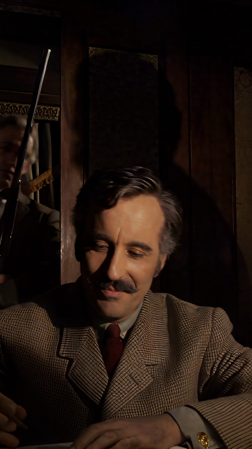 A naive vertical center crop that hands back one man from a two man scene.